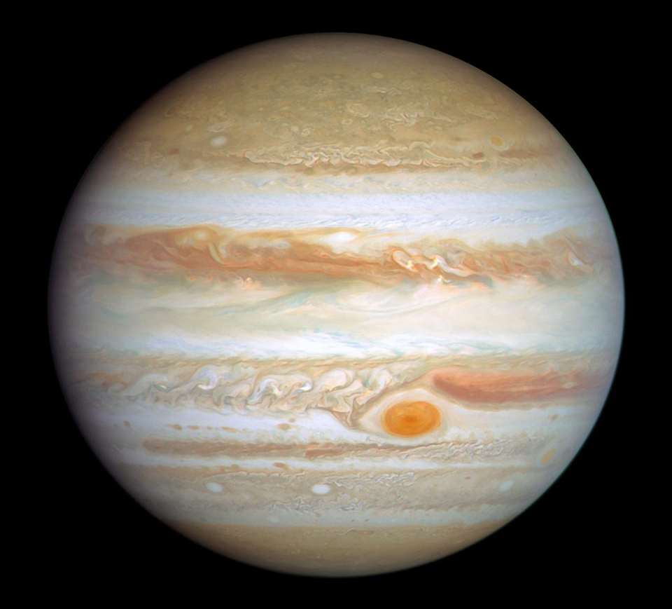 Júpiter fotografado pelo telescópio espacial Hubble, com as faixas de nuvens e a Grande Mancha Vermelha
